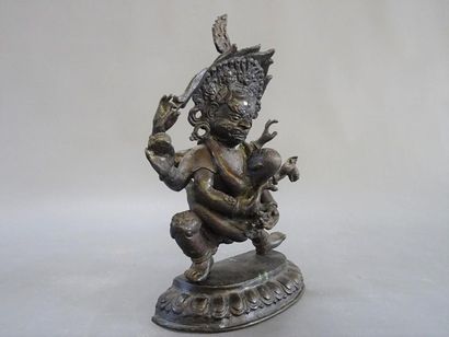 Divinité asiatique en bronze patiné
23 x...