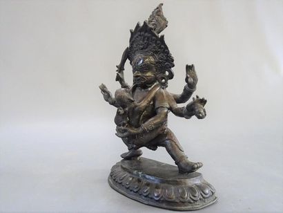 Divinité asiatique en bronze patiné
23 x...