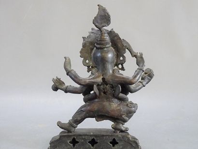 Divinité asiatique en bronze patiné
23 x...