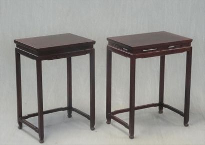 Deux sellettes en bois exotique de style...