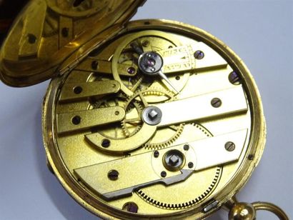 Montre de poche en or ciselé d'un décor de...