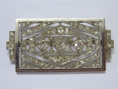 Broche en or 750°/00 et platine orné de diamants...