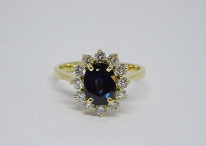 Bague marguerite en or 750°/00, sertie d'un...