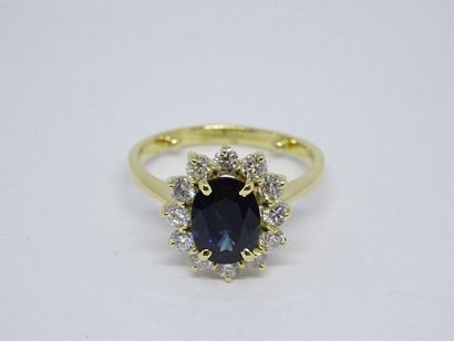 Bague marguerite en or 750°/00, sertie d'un...