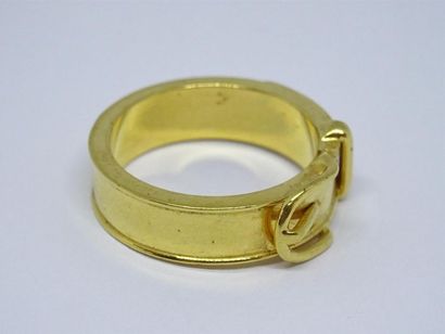 Hermes bague en métal doré figurant une ceinture....