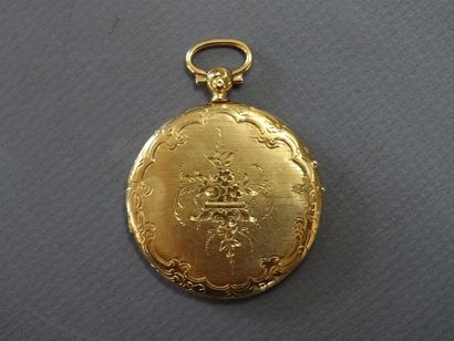 Médaillon rond porte souvenir en or jaune...