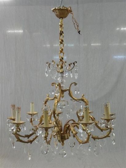 Lucien GAU:
Lustre en bronze doré et cristal,...