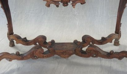 Table à gibier en chêne sculpté formant console,...