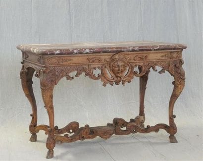 Table à gibier en chêne sculpté formant console,...