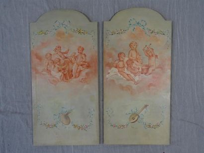 Paire de tableaux aux putti allégoriques...
