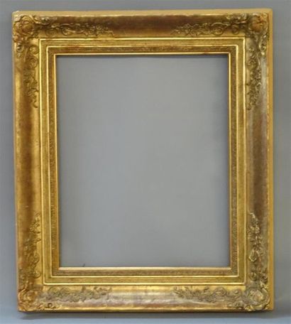 Cadre en bois et stuc doré style Louis XV...