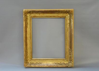 Cadre en bois et stuc doré style Louis XV...