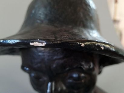 Man with a hat. 
Sculpture in patinated plaster....