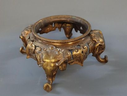 Bronze base with elephant head decoration....