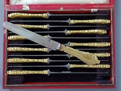In a case, a set of twelve dessert knives...