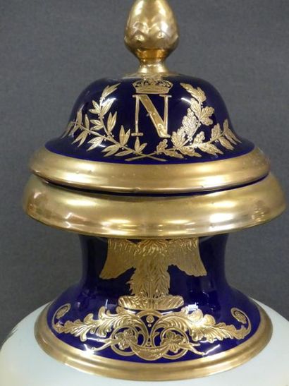 Pair of large covered porcelain spindle vases
Empire...