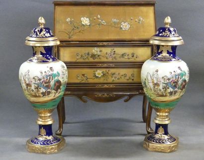 Pair of large covered porcelain spindle vases
Empire...