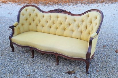 Three-seat mahogany sofa, yellow fabric.
Napoleon...