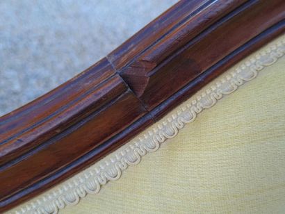 Three-seat mahogany sofa, yellow fabric.
Napoleon...