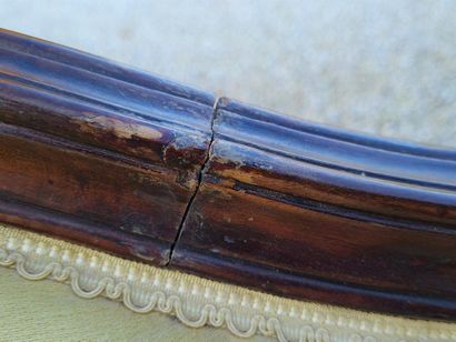Three-seat mahogany sofa, yellow fabric.
Napoleon...