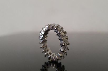Platinum wedding band set with 20 shuttle-cut...