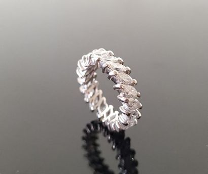 Platinum wedding band set with 20 shuttle-cut...
