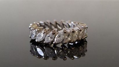 Platinum wedding band set with 20 shuttle-cut...