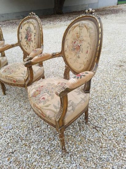 Wooden and gilded stucco living room, upholstered...