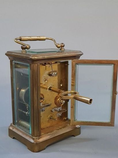 Travel alarm clock with canvas box. Watchmaker...