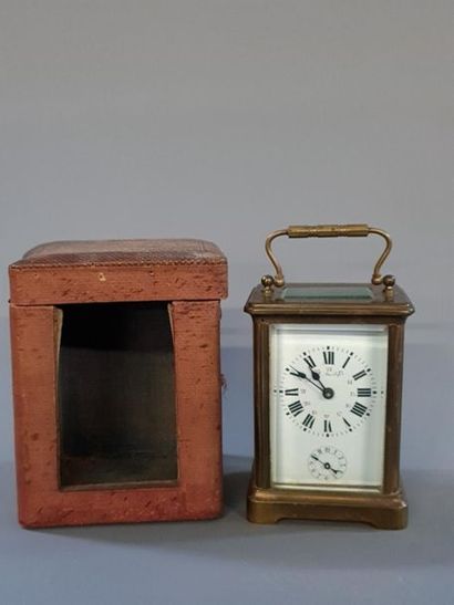 Travel alarm clock with canvas box. Watchmaker...