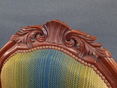 Pair of mahogany armchairs with striped fabric.
End...
