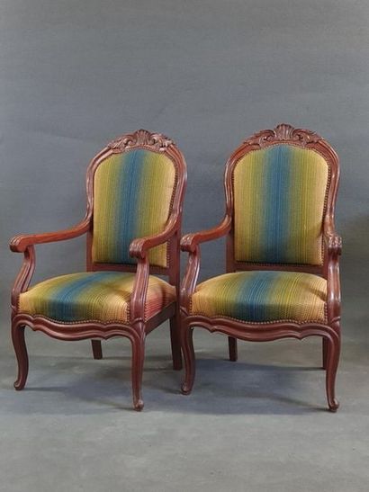 Pair of mahogany armchairs with striped fabric.
End...