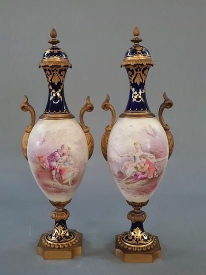Pair of covered porcelain vases with a gallant...