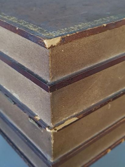 Leather-wrapped book case with trompe l'oeil...