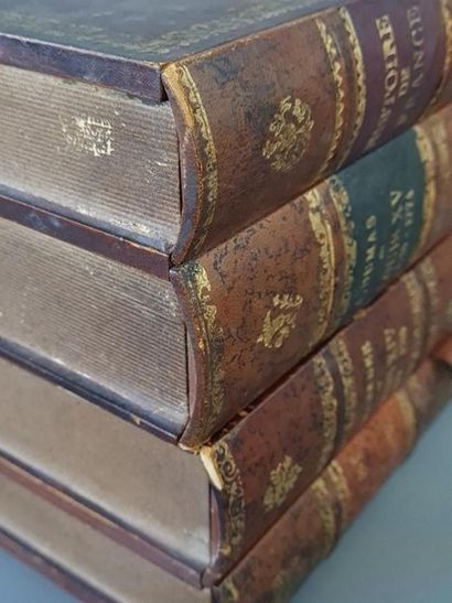 Leather-wrapped book case with trompe l'oeil...