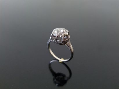 Platinum ring set with diamonds, a central...