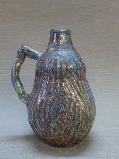 Eugène LION (1867-1945)
Vase à anse latérale,...