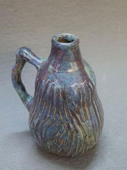 Eugène LION (1867-1945)
Vase à anse latérale,...
