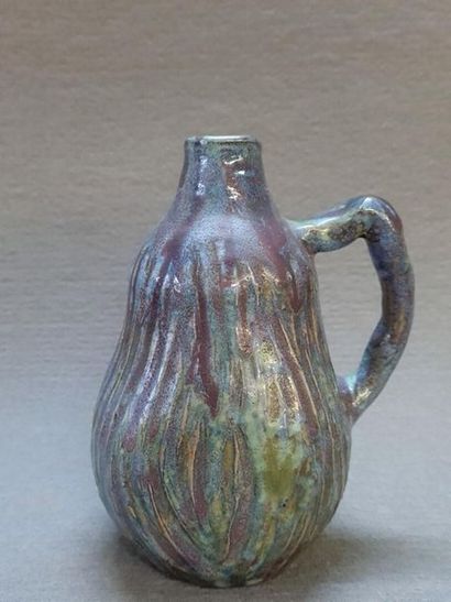 Eugène LION (1867-1945)
Vase à anse latérale,...