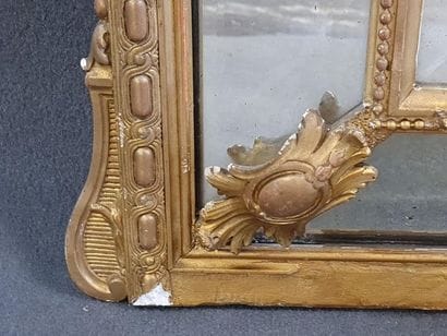 Mirror with wooden and gilded stucco glass...
