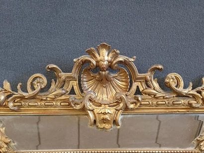 Mirror with wooden and gilded stucco glass...