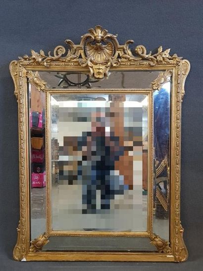 Mirror with wooden and gilded stucco glass...