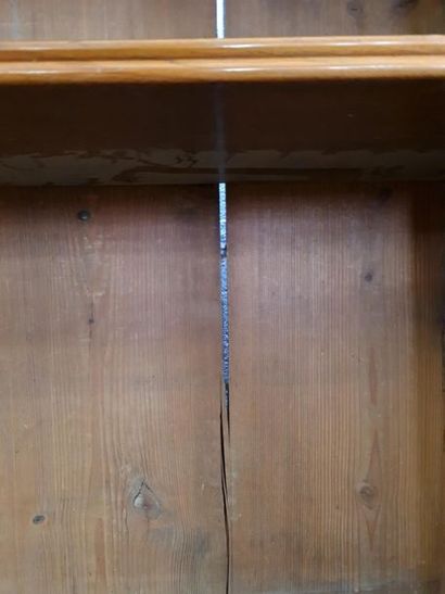 Large bookcase in fruit-wood with three doors...