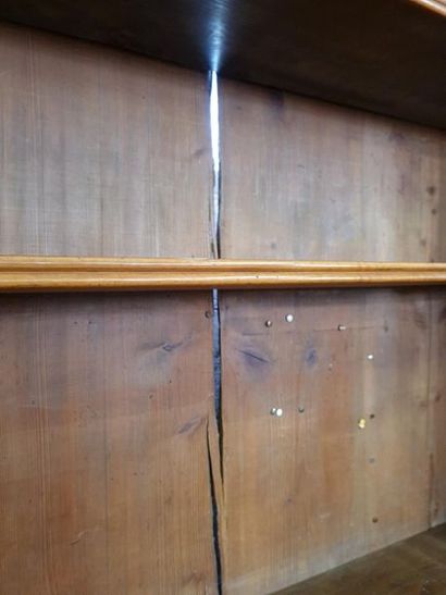 Large bookcase in fruit-wood with three doors...