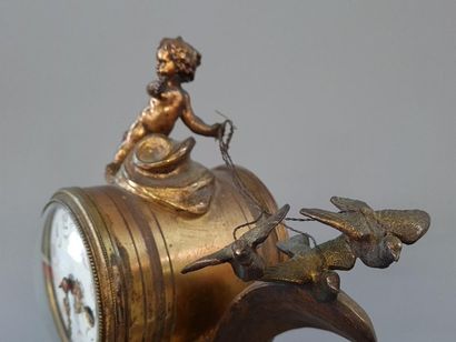 Bronze clock, white alabaster base, the dial...