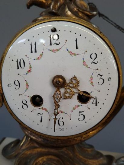 Bronze clock, white alabaster base, the dial...