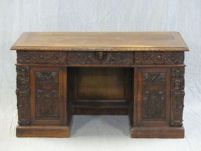 Middle desk with richly carved neo-Renaissance...