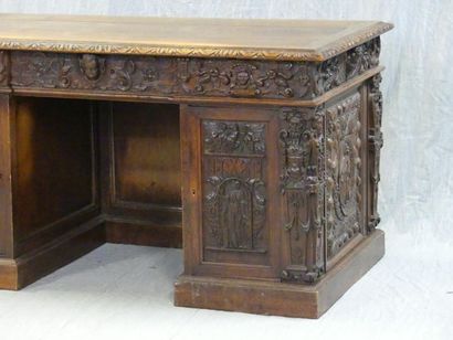 Middle desk with richly carved neo-Renaissance...