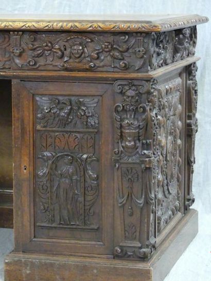 Middle desk with richly carved neo-Renaissance...