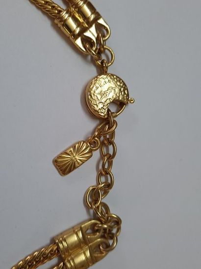 YVES SAINT LAURENT
Large gold-plated metal...